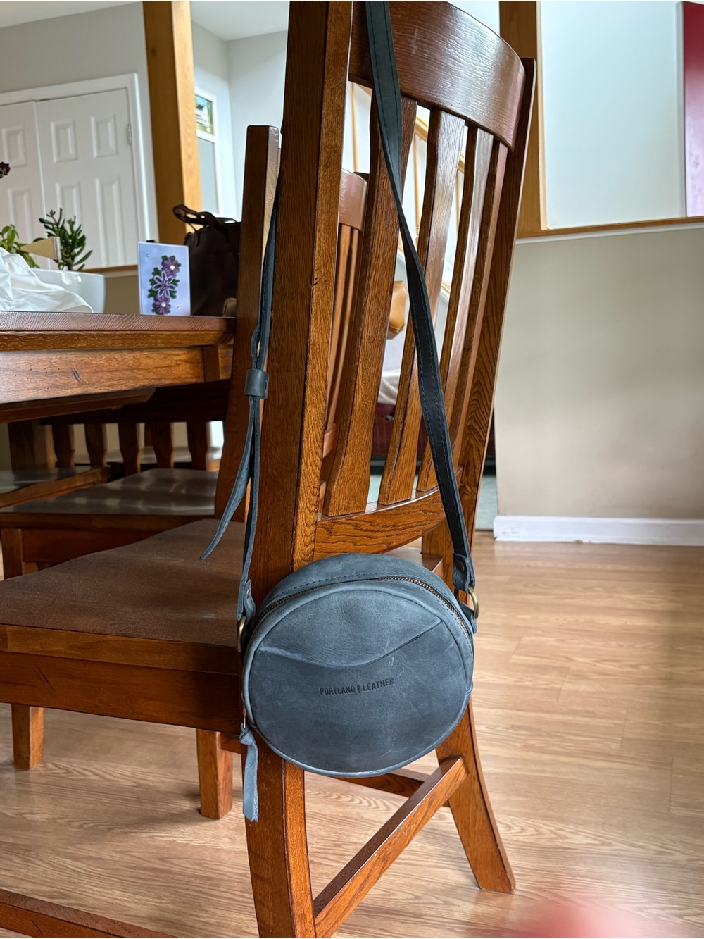 Portland Leather Charcoal Round Leather Crossbody Bag